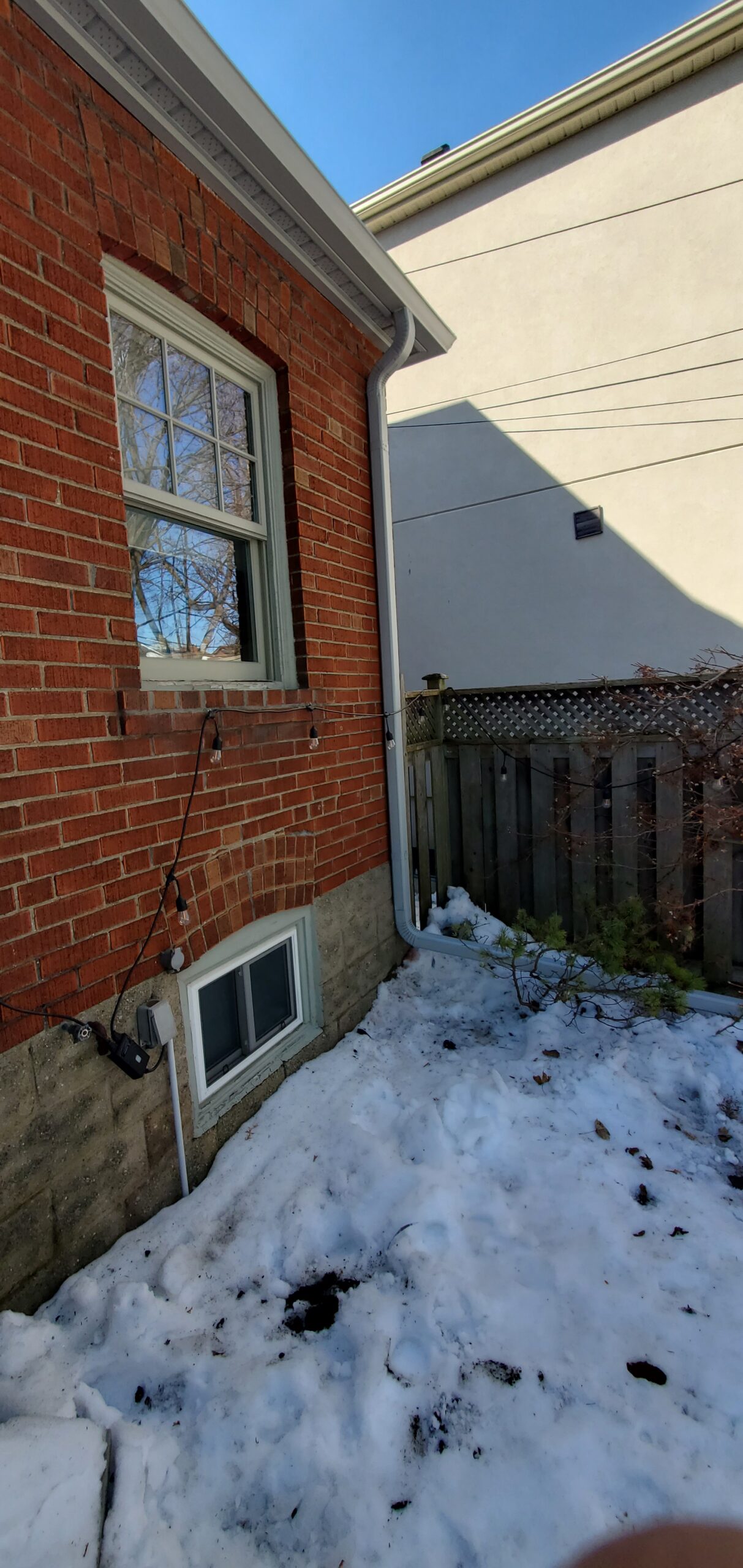 frieze board and custom aluminum capping on exterior trim