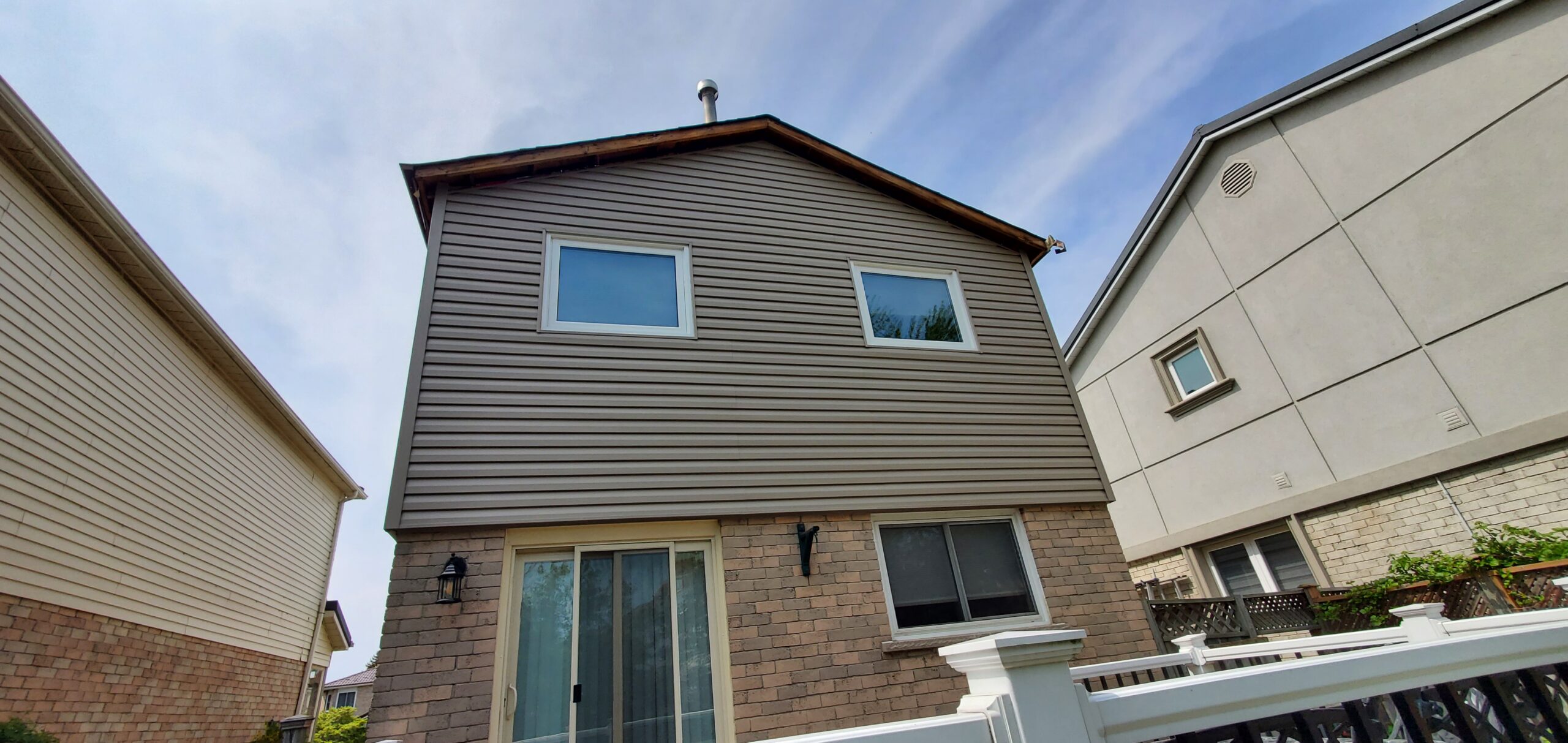 finished siding and soffit installation on residential home exterior