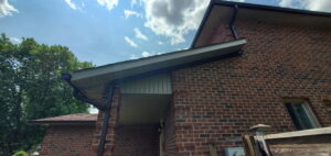 downspout repair at roofline connection Toronto home