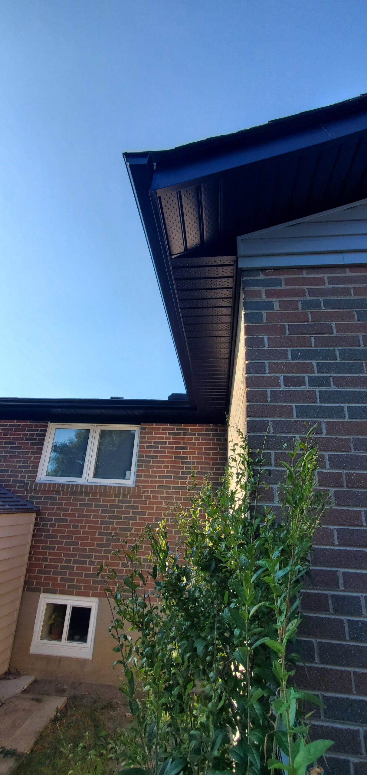 fascia replacement with new aluminum trim along roofline