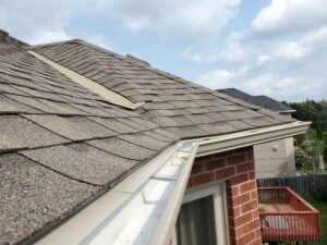 roofline corner with continuous drip edge installation on shingles