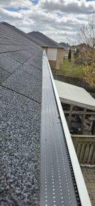 Aluminum gutter guard installed with clean finish