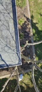 Gutter guard detail showing layered protection system
